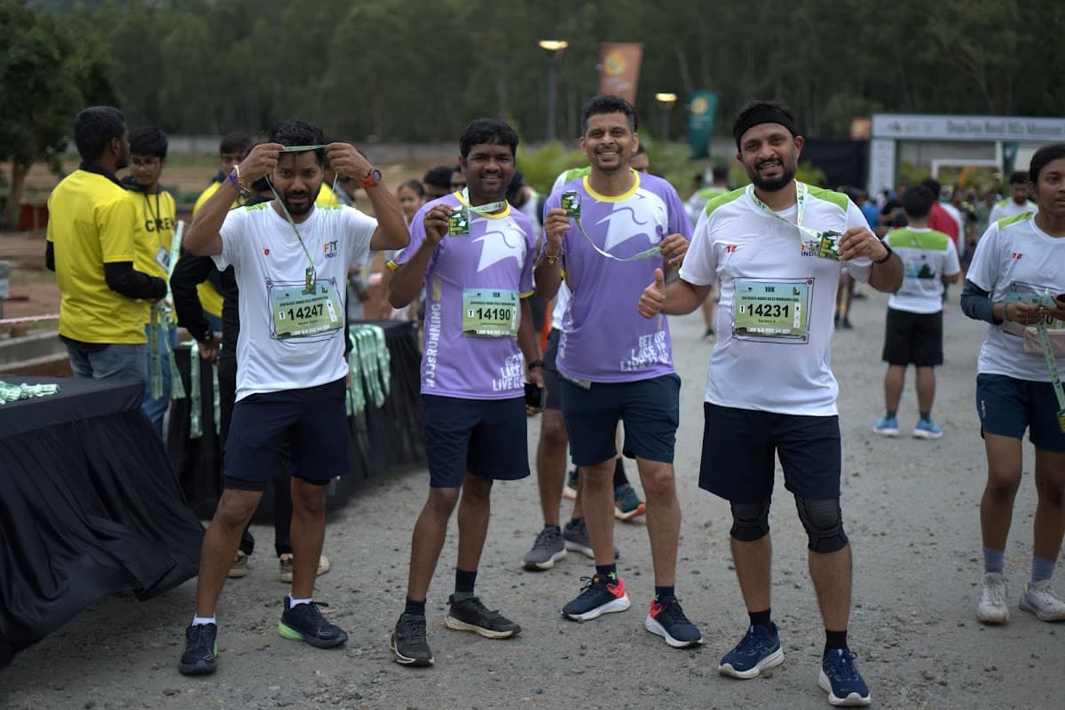 Finishers proudly showing their medals