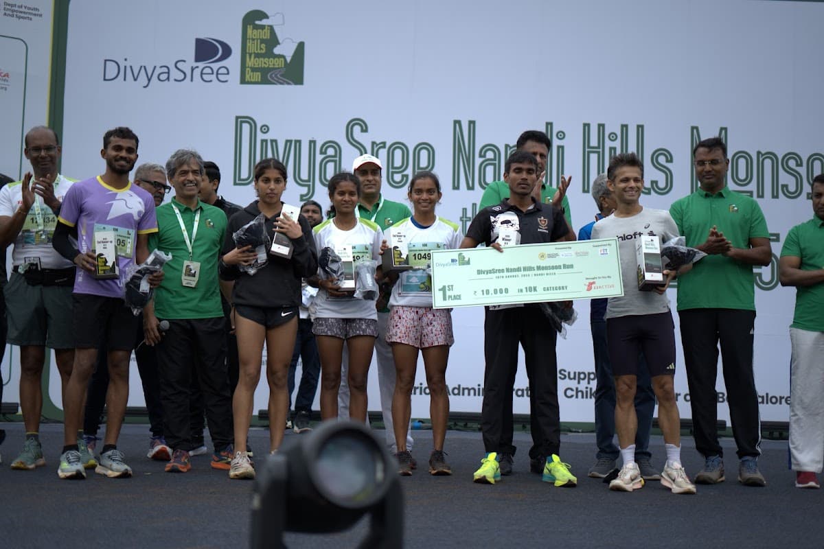 10K winners group photo on stage
